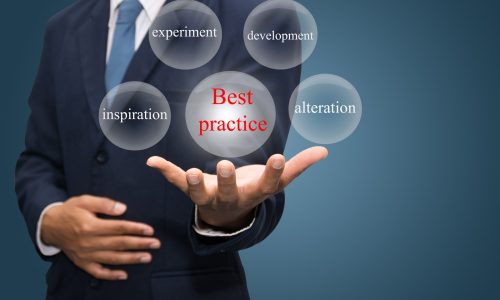 businessman hand write a best practice